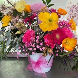 Seasonal flowers in a jar